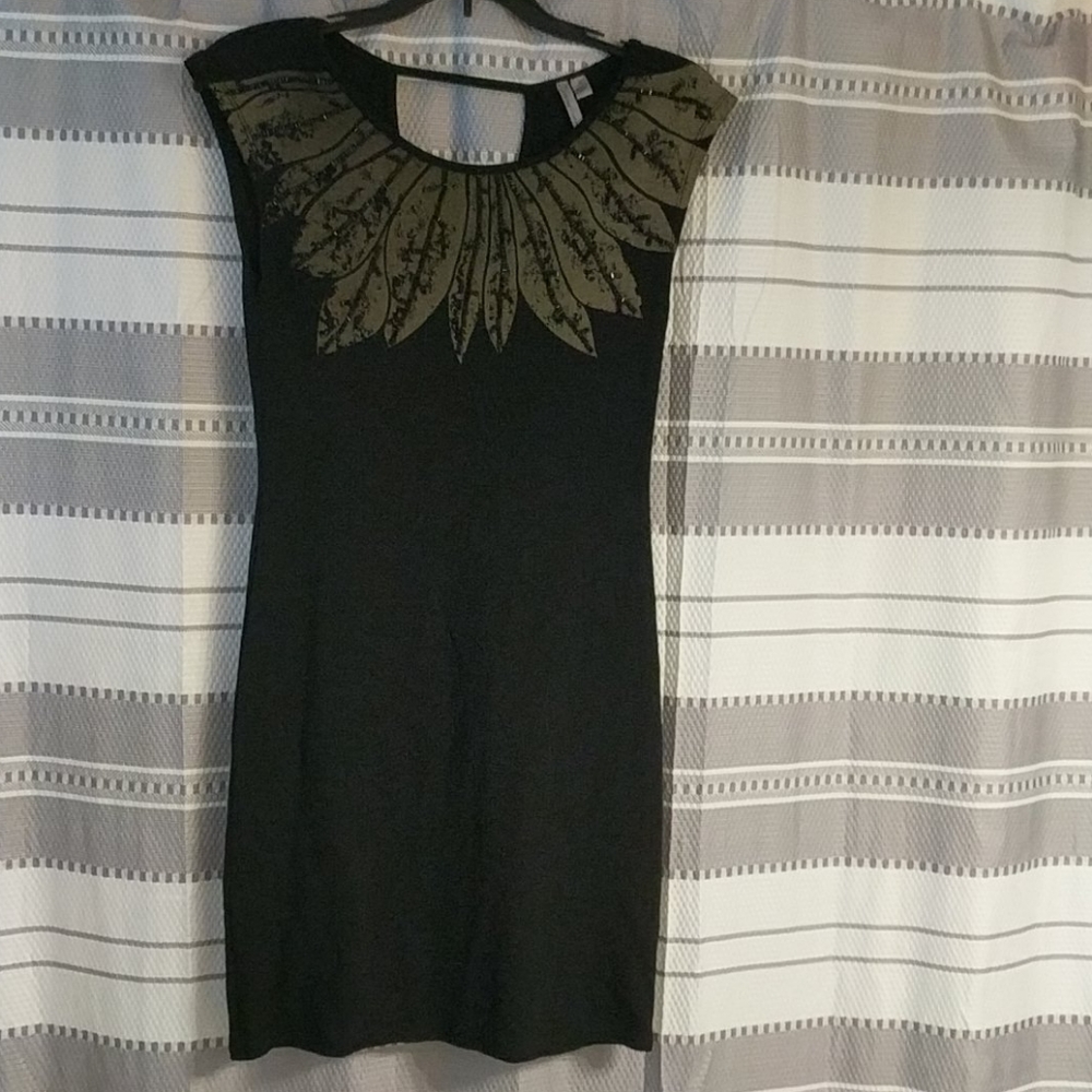 Black dress with embellished neckline